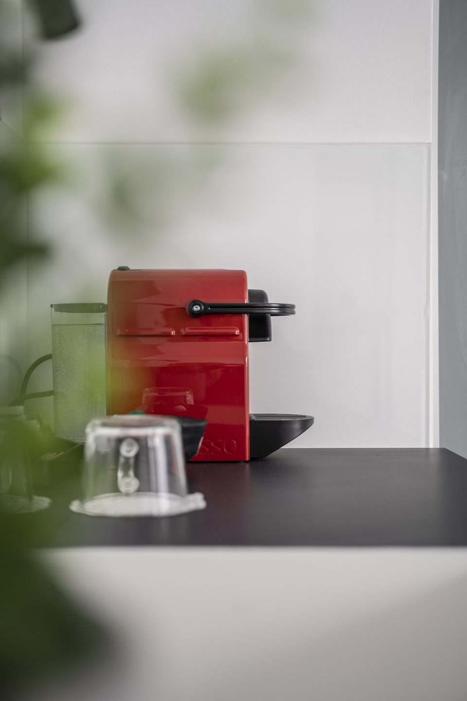 Red Nespresso machine in the room